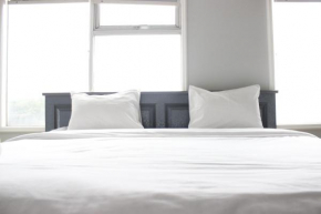 Spacious & Trendy Studio at Jarrdin Cihampelas Apartment By Travelio